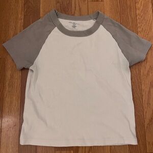 white Brandy Melville shirt with tan sleeves